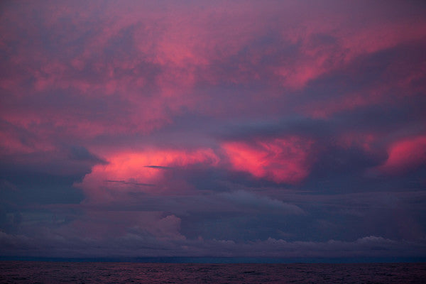 October 21, 2014. Leg 1 onboard Team Alvimedica. Day 10 brings the fleet into the ITCZ and the notoriously challenging Doldrums, an area of volatile and unpredictable weather. The clouds continue to grow in intensity long after the sun has set.